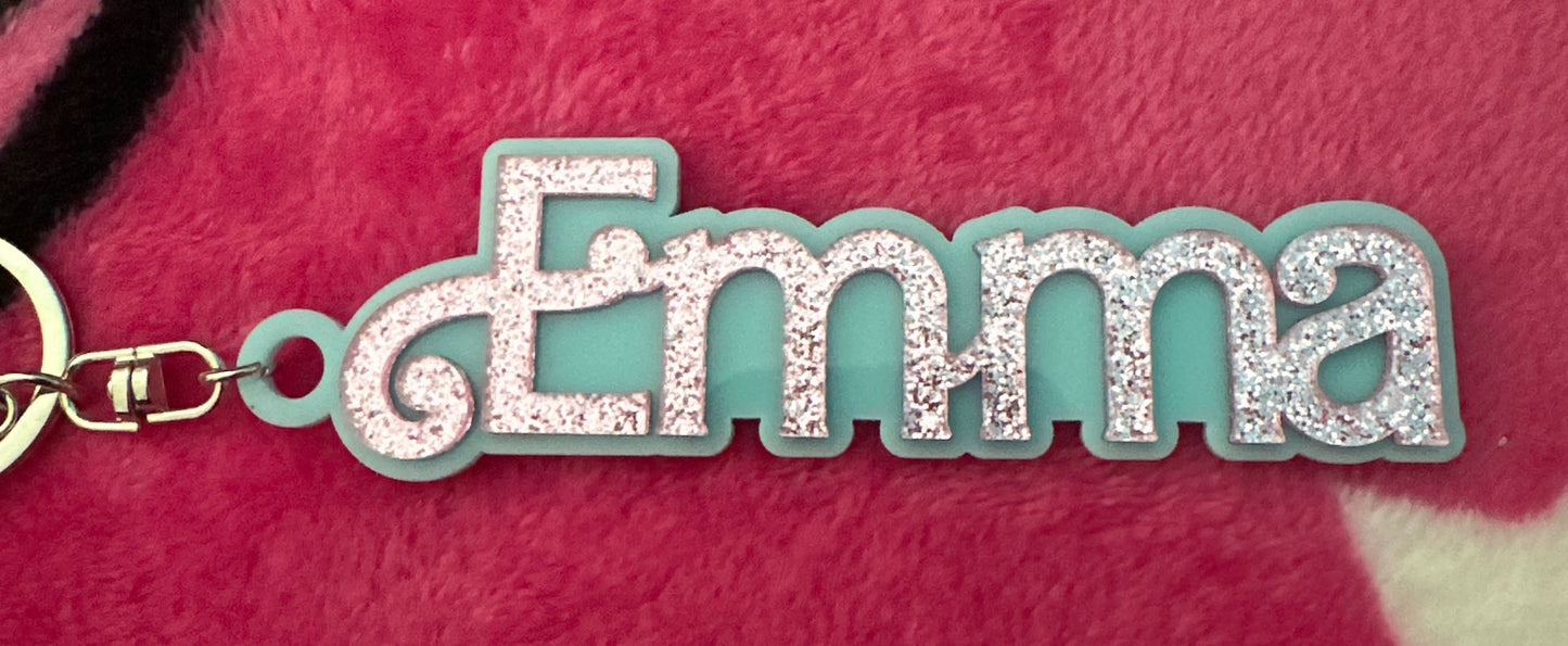 Customer photo - cyan name charm