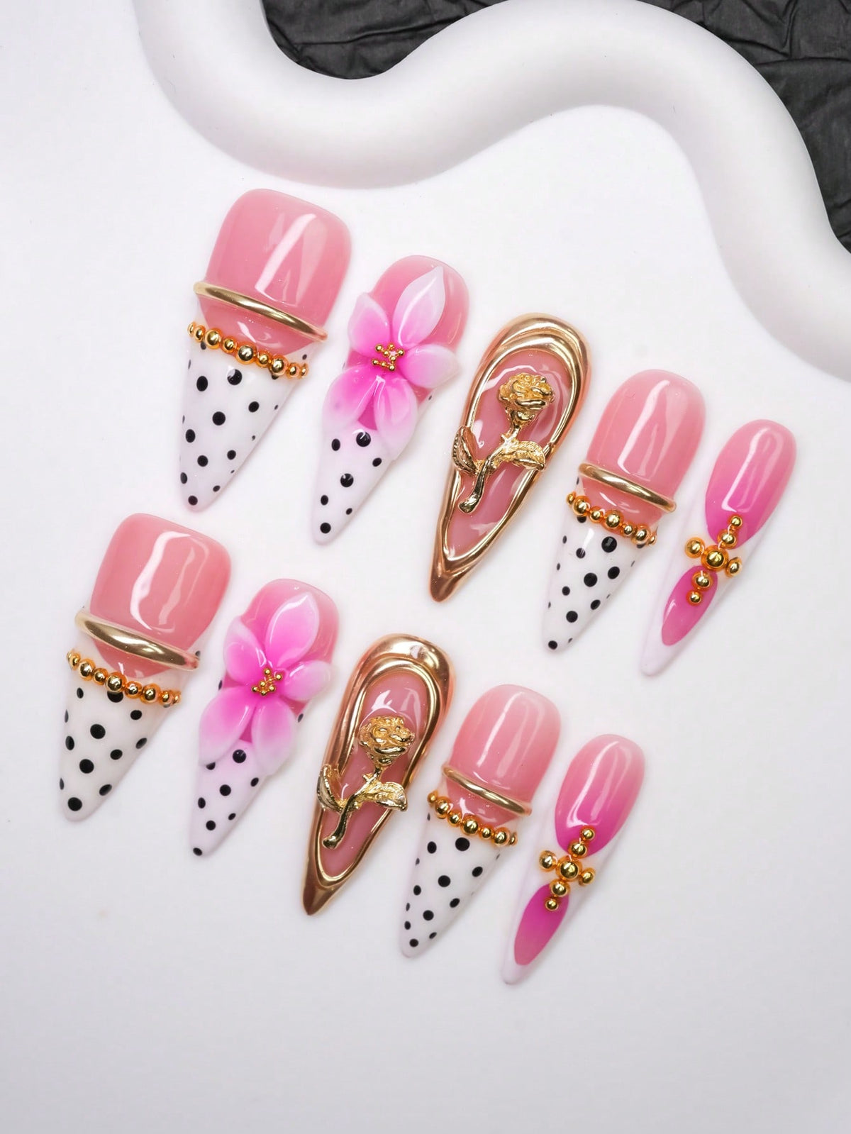 Polka dot pink gradient almond press-on nails