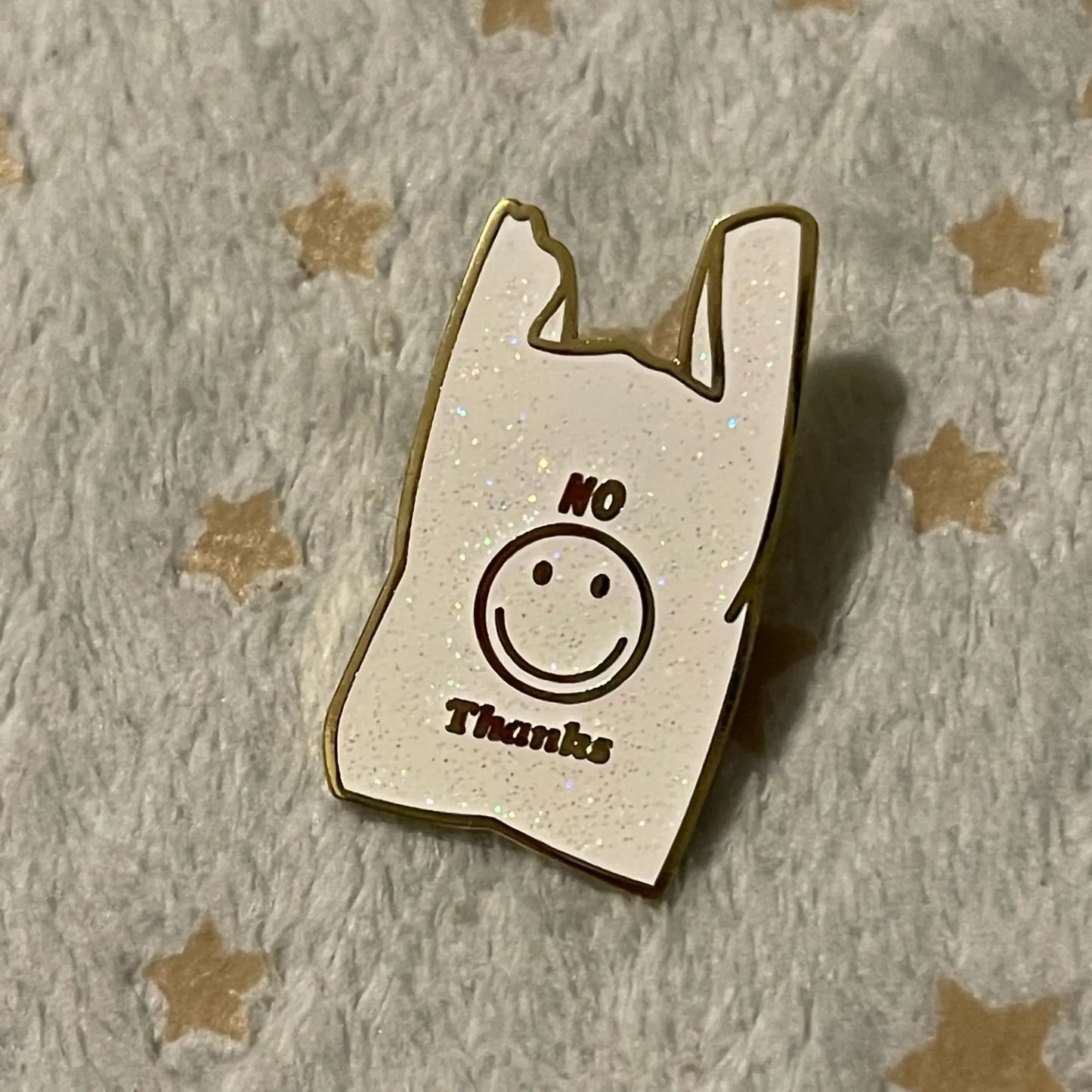 No Thanks pin in hand - real sparkle detail