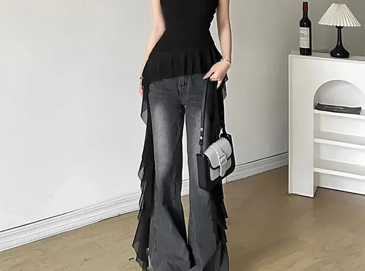 Black fitted top with pleated peplum and long chiffon ruffle down the back