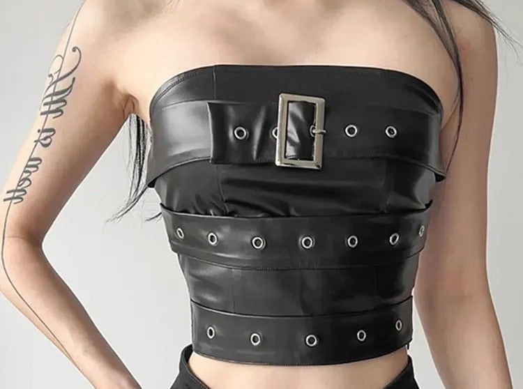 Black faux leather tube top with buckle and grommet studded belt straps