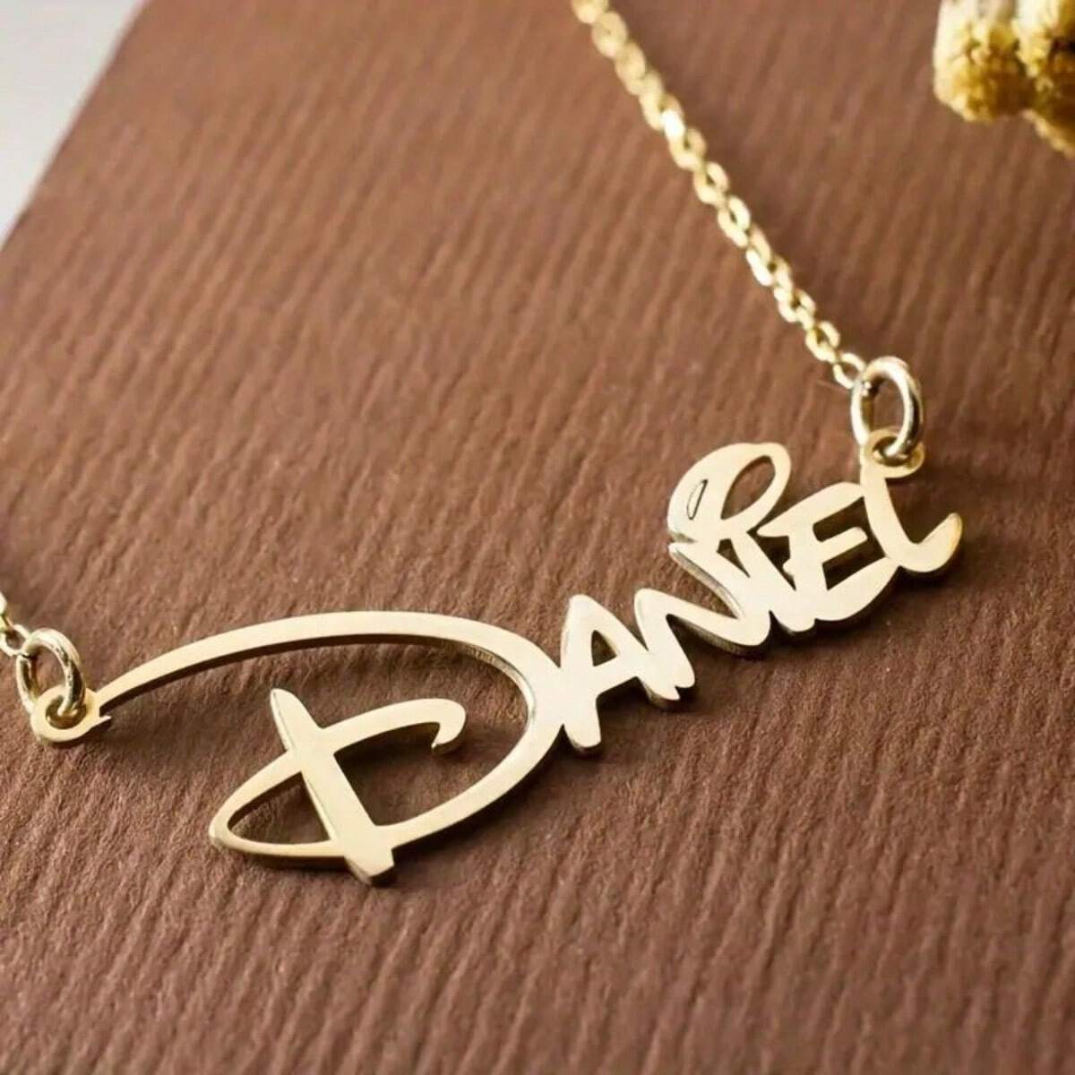 Close up of the laser cut script nameplate