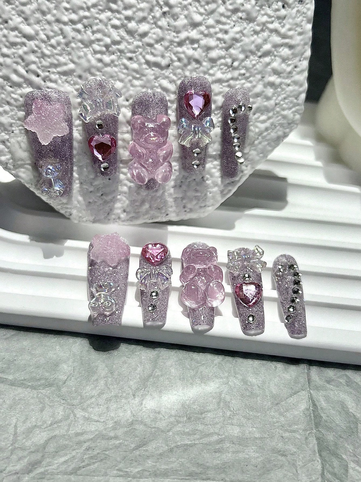 Strawberry Milk Bear press on nails with heart gems and iridescent bows