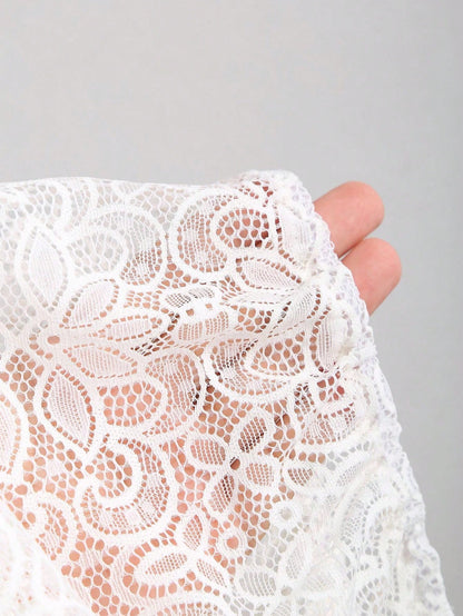 Sheer floral lace held in hand