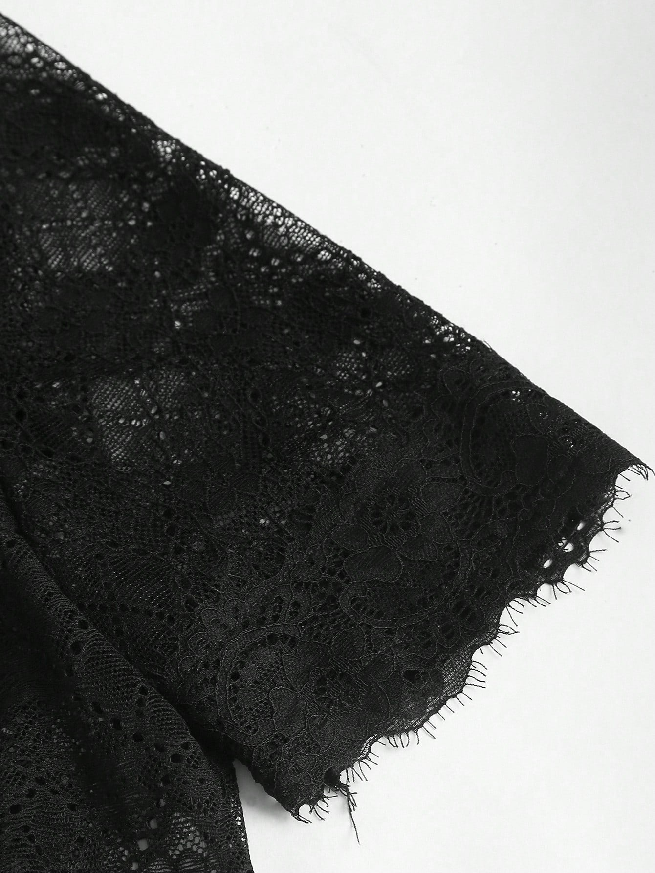 Eyelash lace cuff detail in black