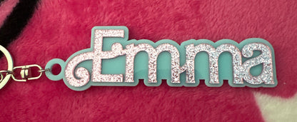 Customer photo - cyan name charm