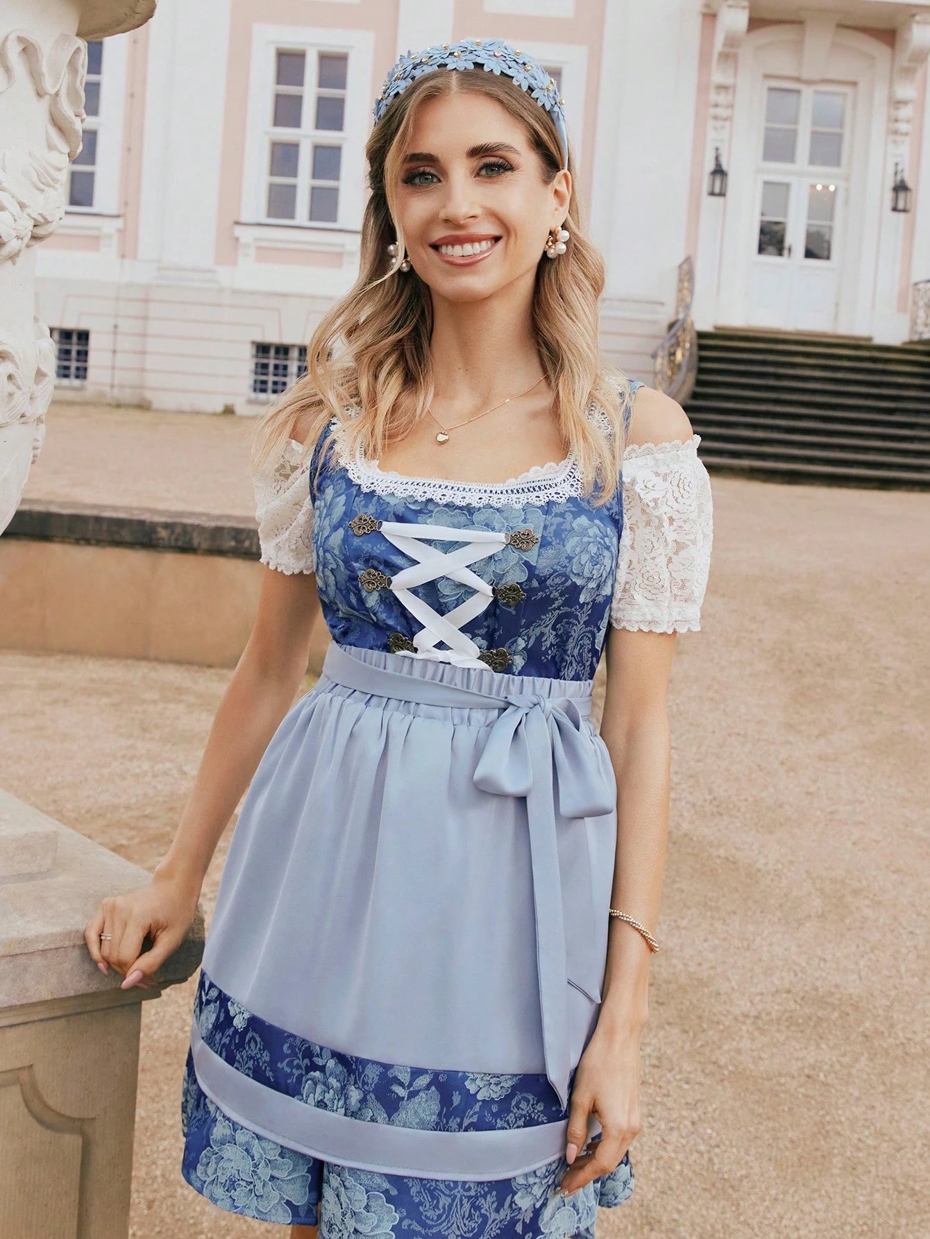 Lace blouse styled under a blue dirndl, dress not included