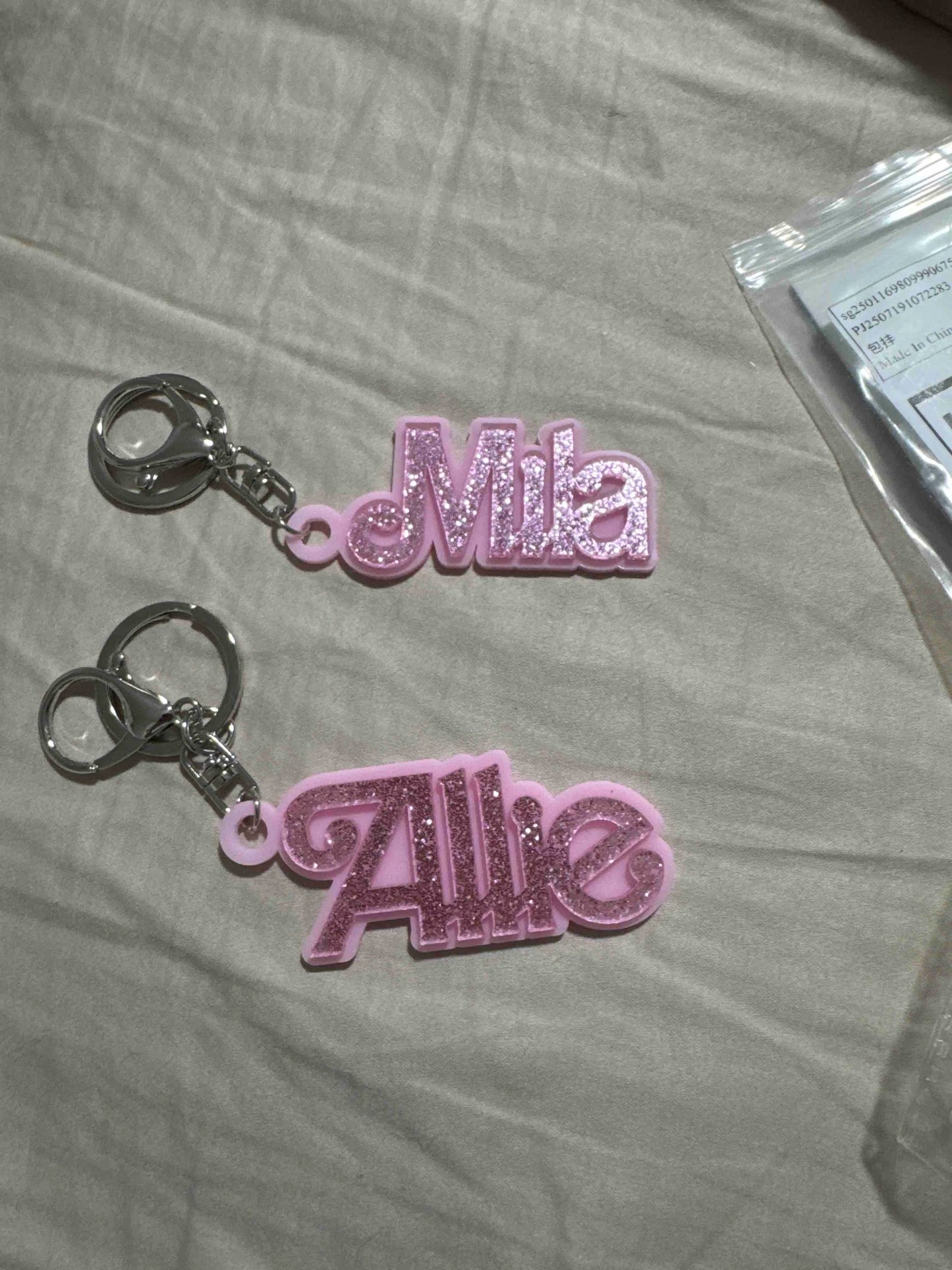 Customer photo - two personalized name charms