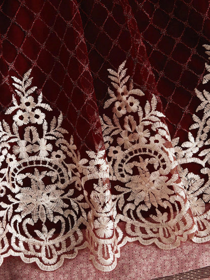 Embroidered lattice hem detail