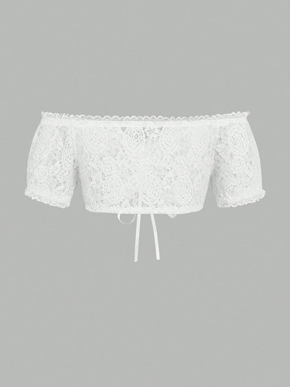Lace cropped blouse laid flat showing the drawstring front