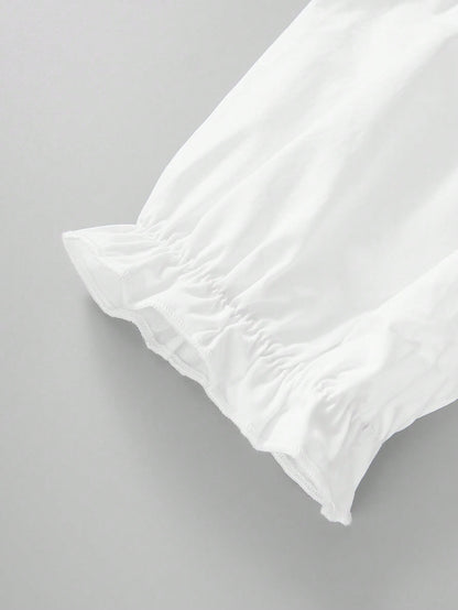 Puff sleeve ruffled cuff detail