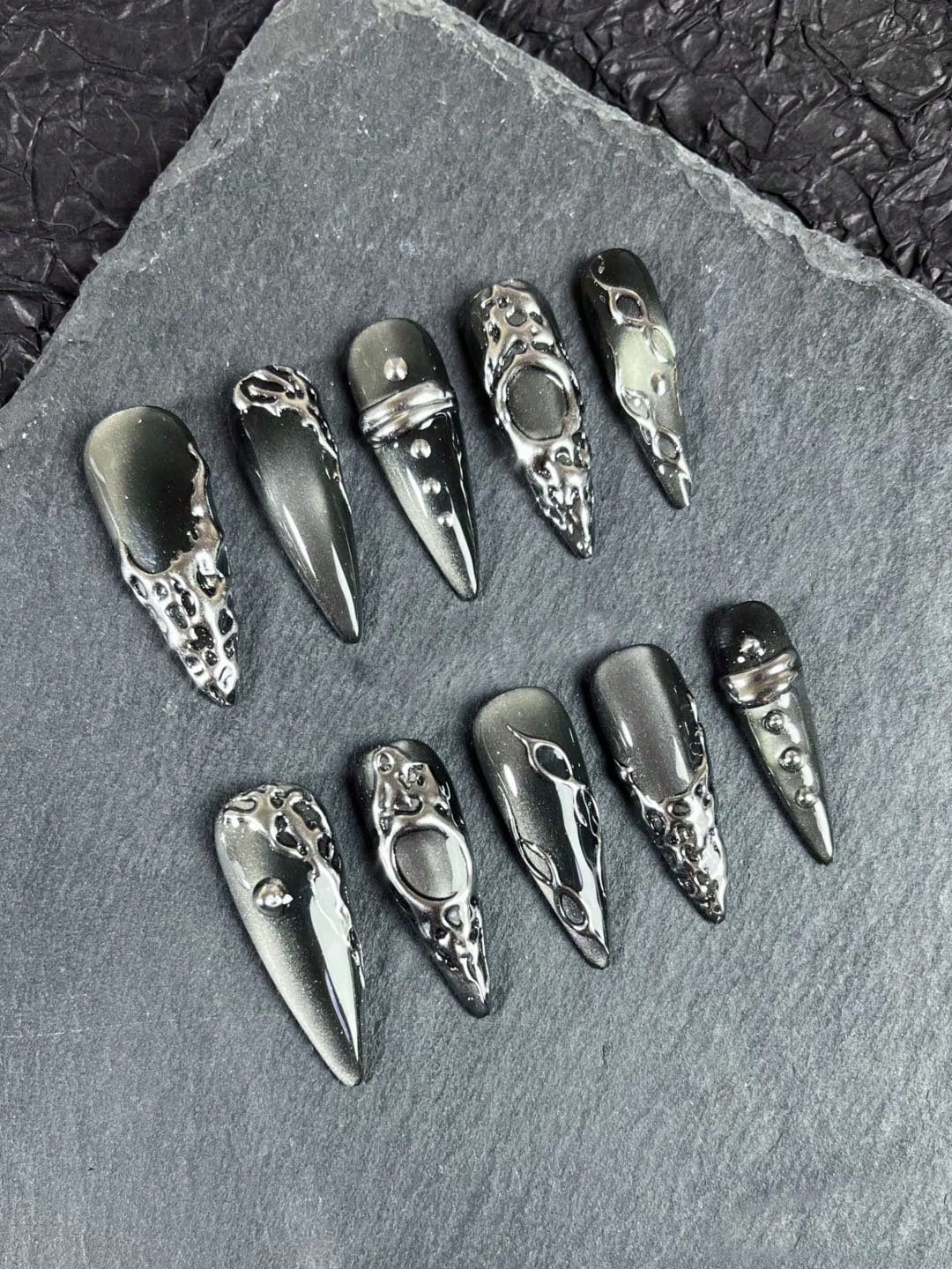 Press-on nail set on slate backdrop