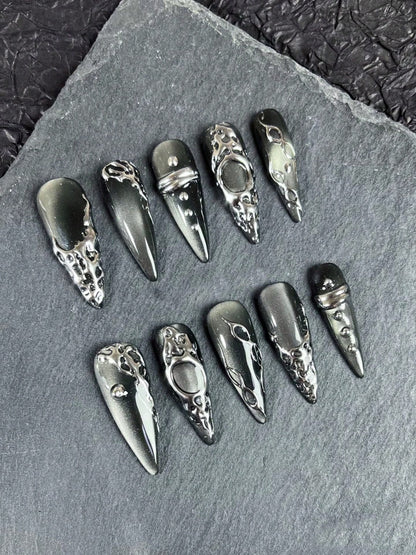 Press-on nail set on slate backdrop