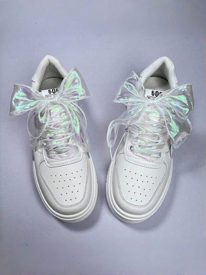 Pearl iridescent organza laces tied in oversized bows