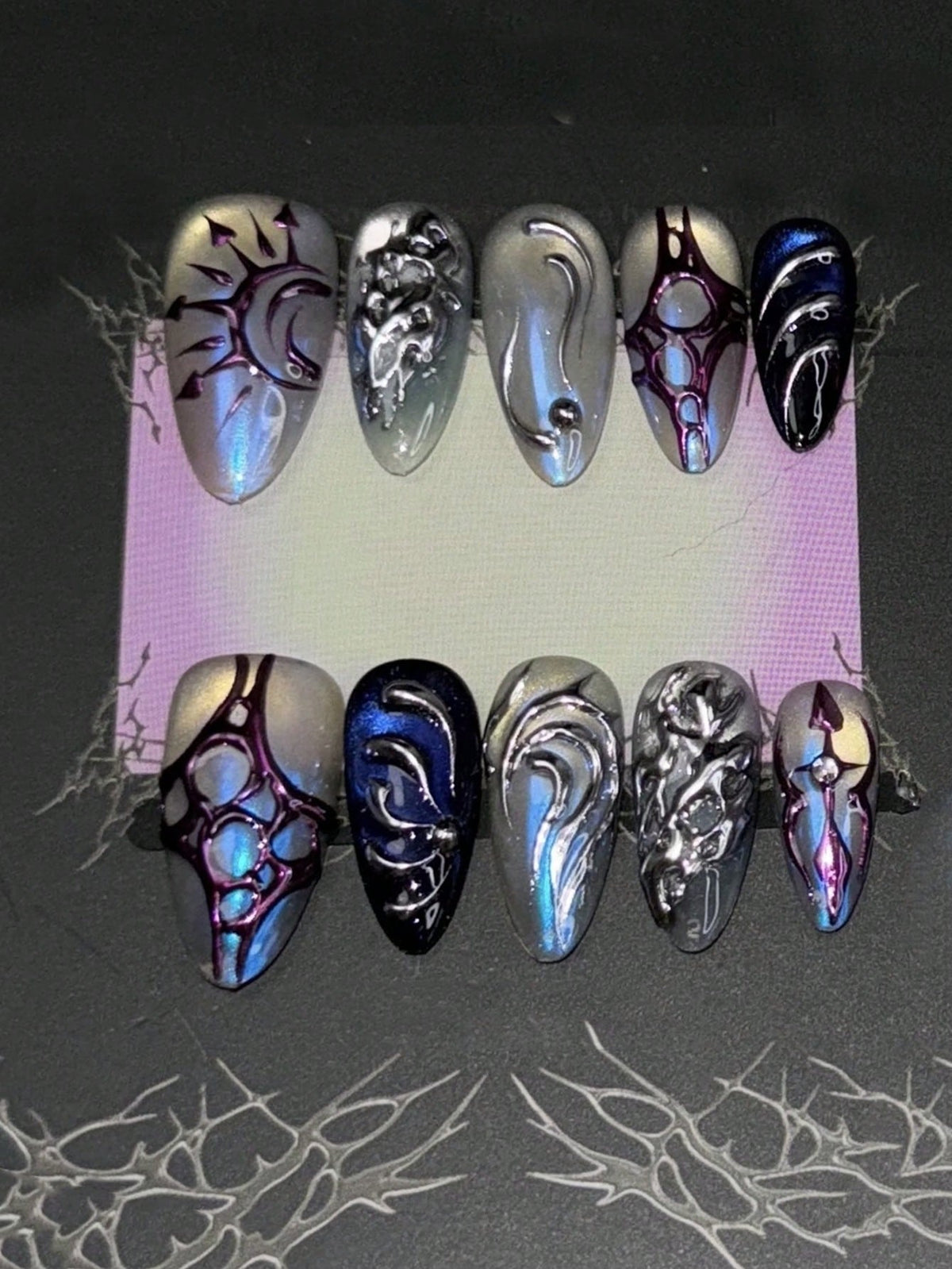 Thornbound Opal press on nails with cobalt cat-eye and silver relief