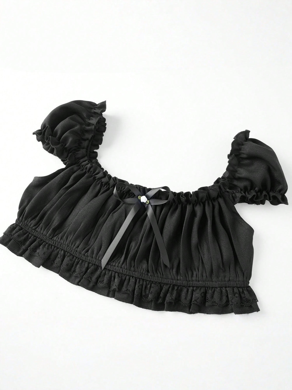 Black Coffee crop top laid flat, angled