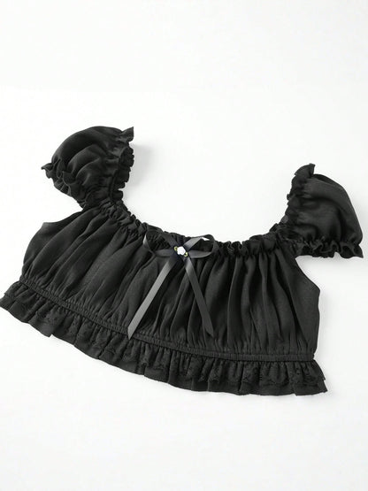Black Coffee crop top laid flat, angled