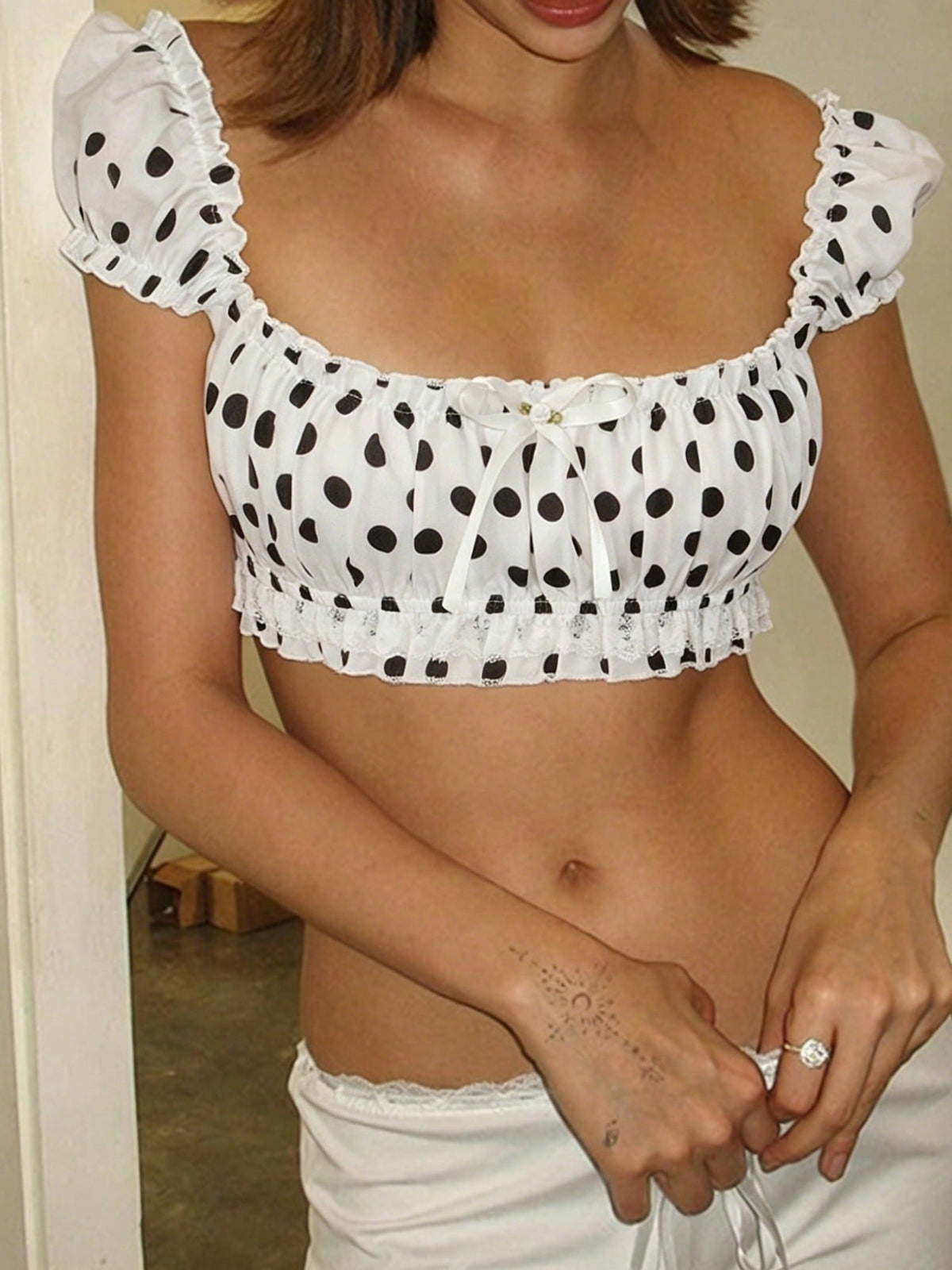 Domino Cream polka dot crop top with ruffle trim