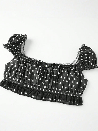 Pin Dot Noir crop top laid flat, angled