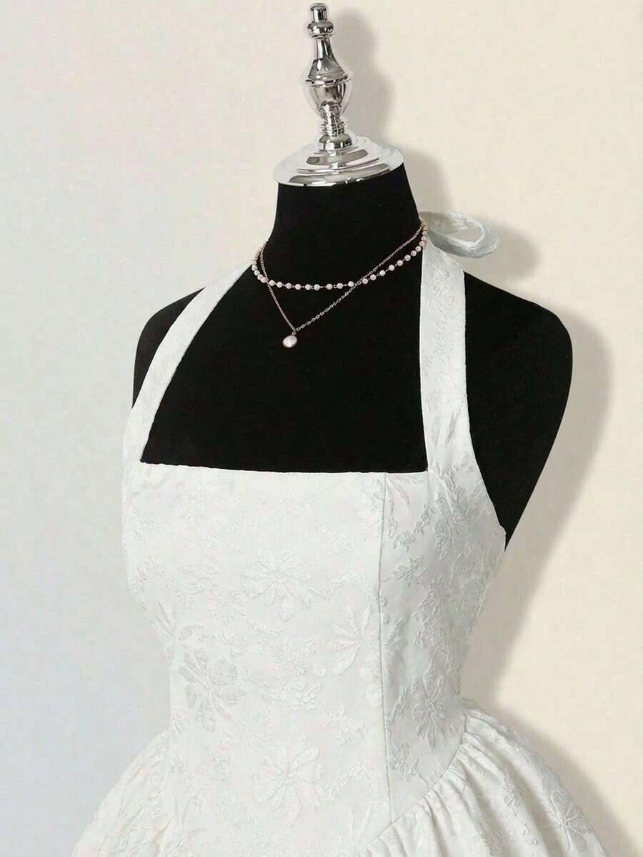 Close up of halter tie and jacquard bodice
