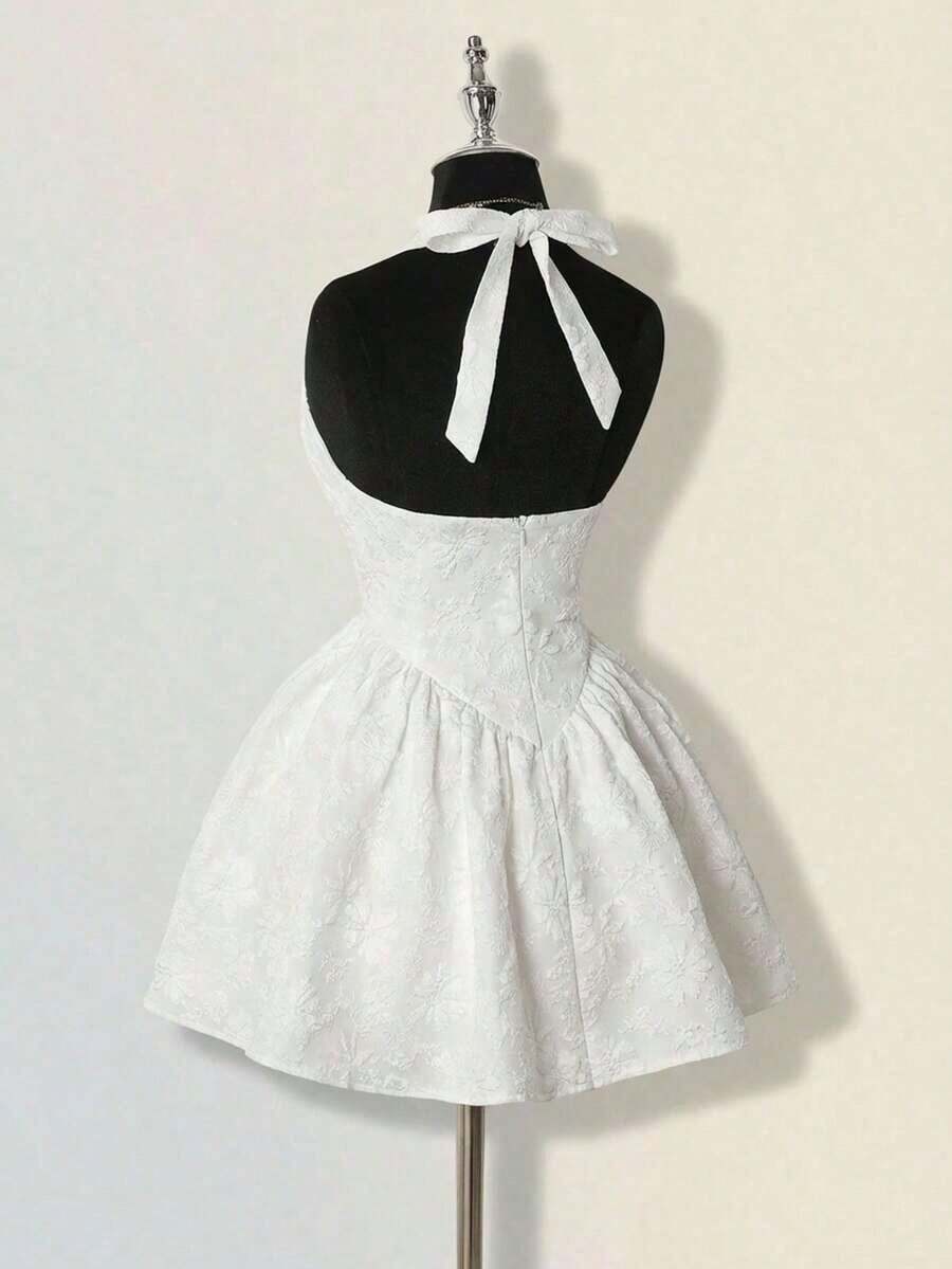 Open back of the halter mini dress