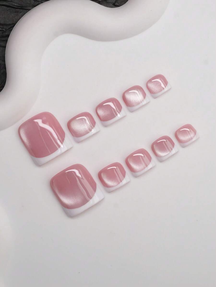 Full set of rose cat-eye short square press-on nails laid out by size