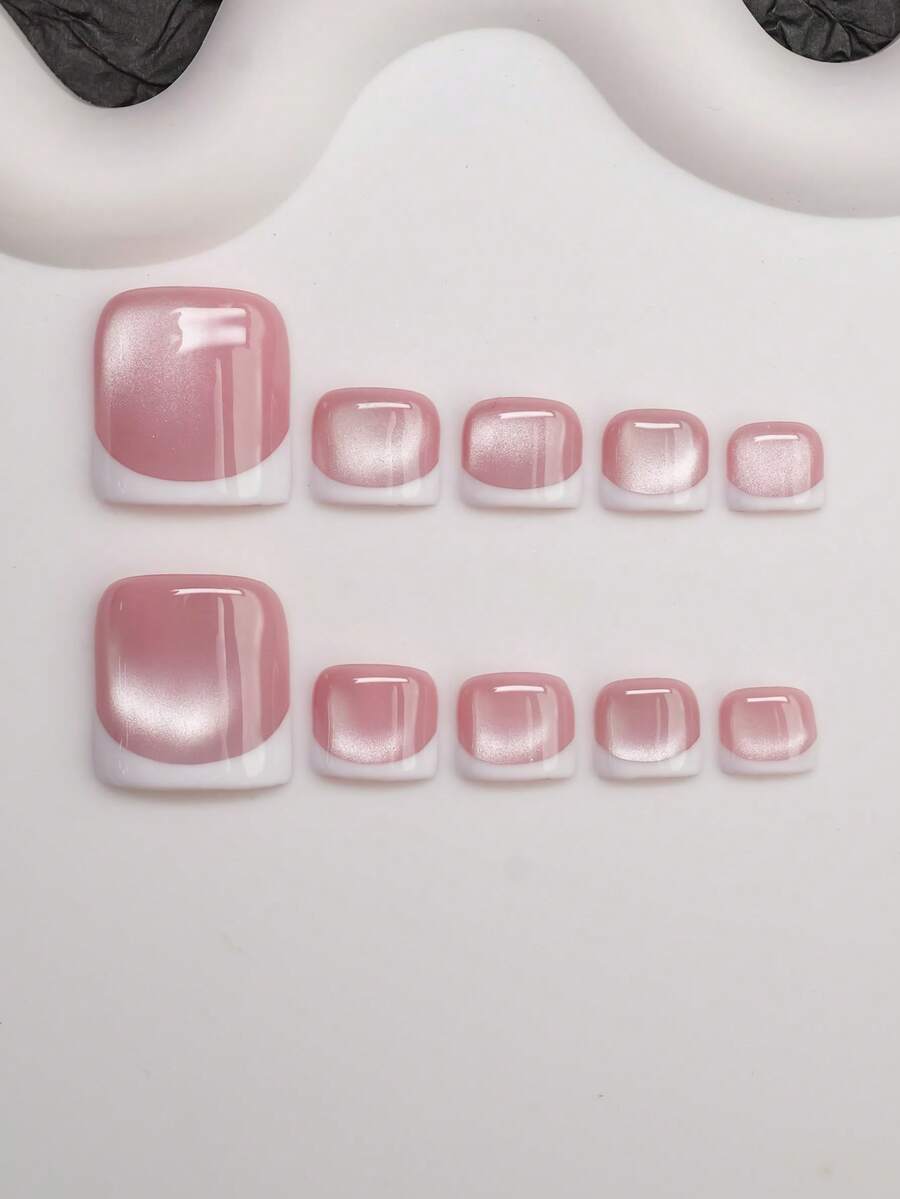 Short soft square press-on nails in rose cat-eye shimmer with a white French edge