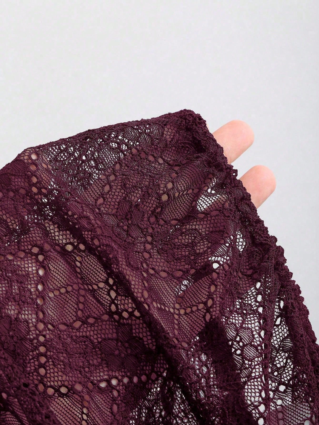 Oxblood lace sleeve detail