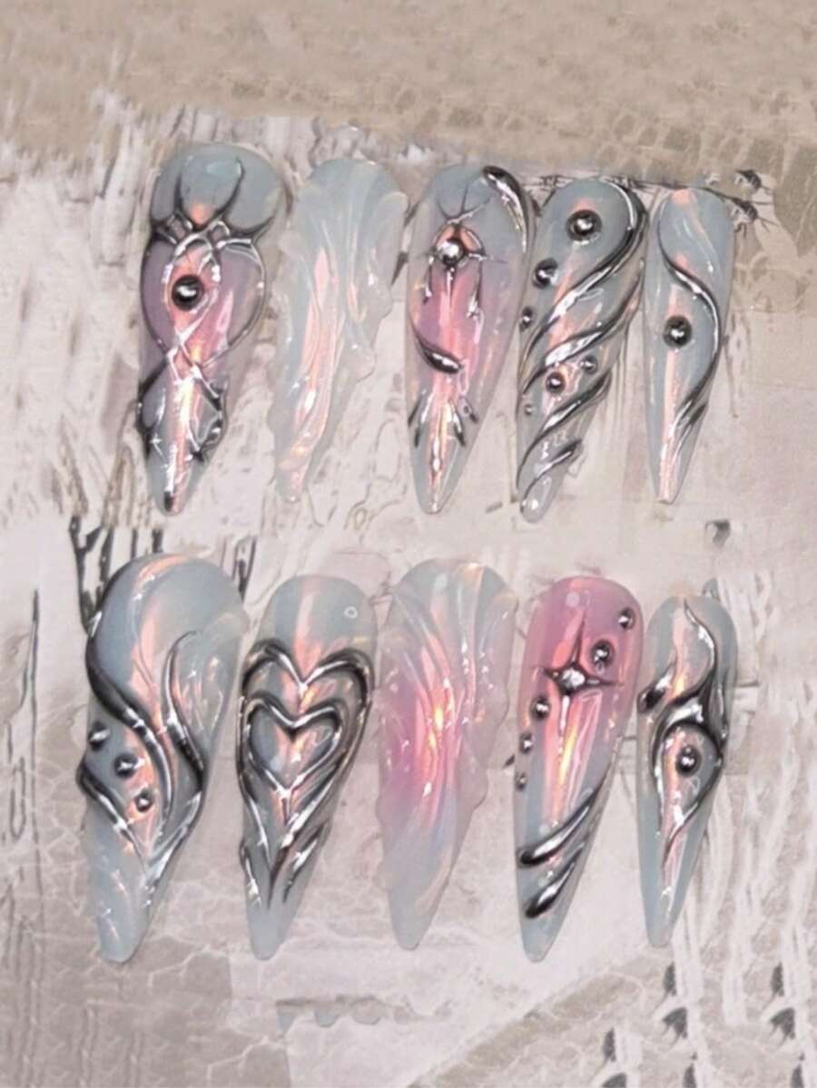 Frosted blue pink heart stiletto press-on nails flat lay