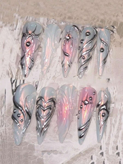 Frosted blue pink heart stiletto press-on nails flat lay