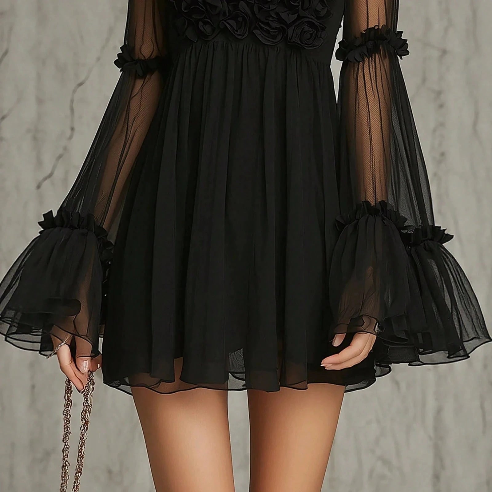 Detail of the tiered mesh skirt and ruffled hem
