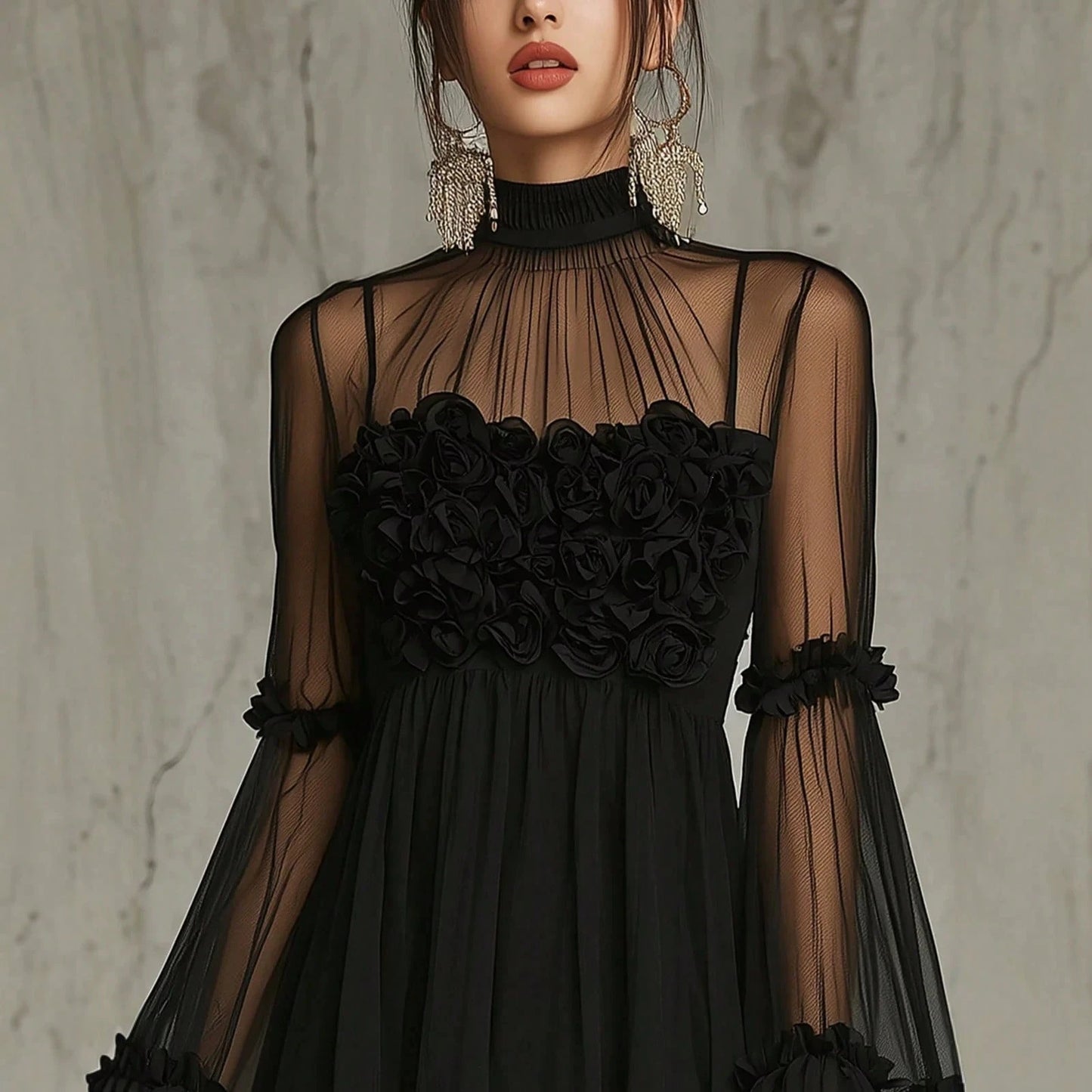 Front view of the black mesh mini dress with ruffled hem