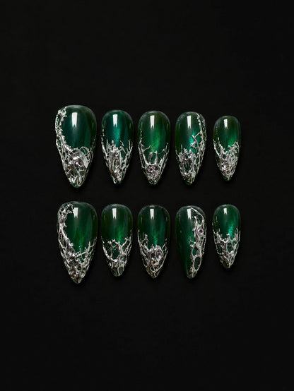 Emerald cat-eye almond press-on nails with liquid silver chrome on black