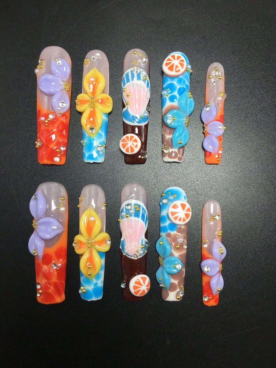 Full set of ten coffin press-on nails laid flat
