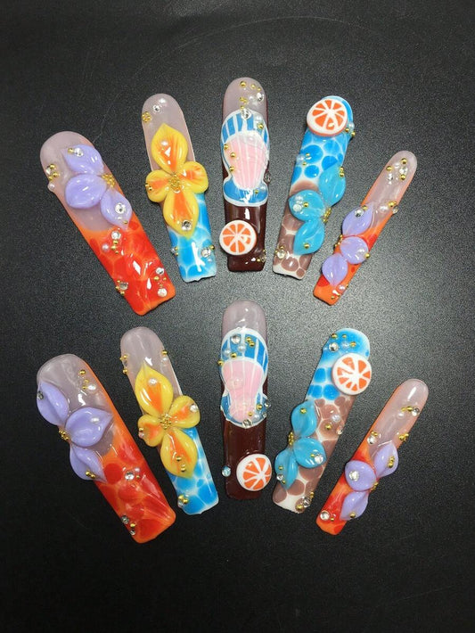 Extra long coffin press-on nails with citrus slices, seashells and flowers
