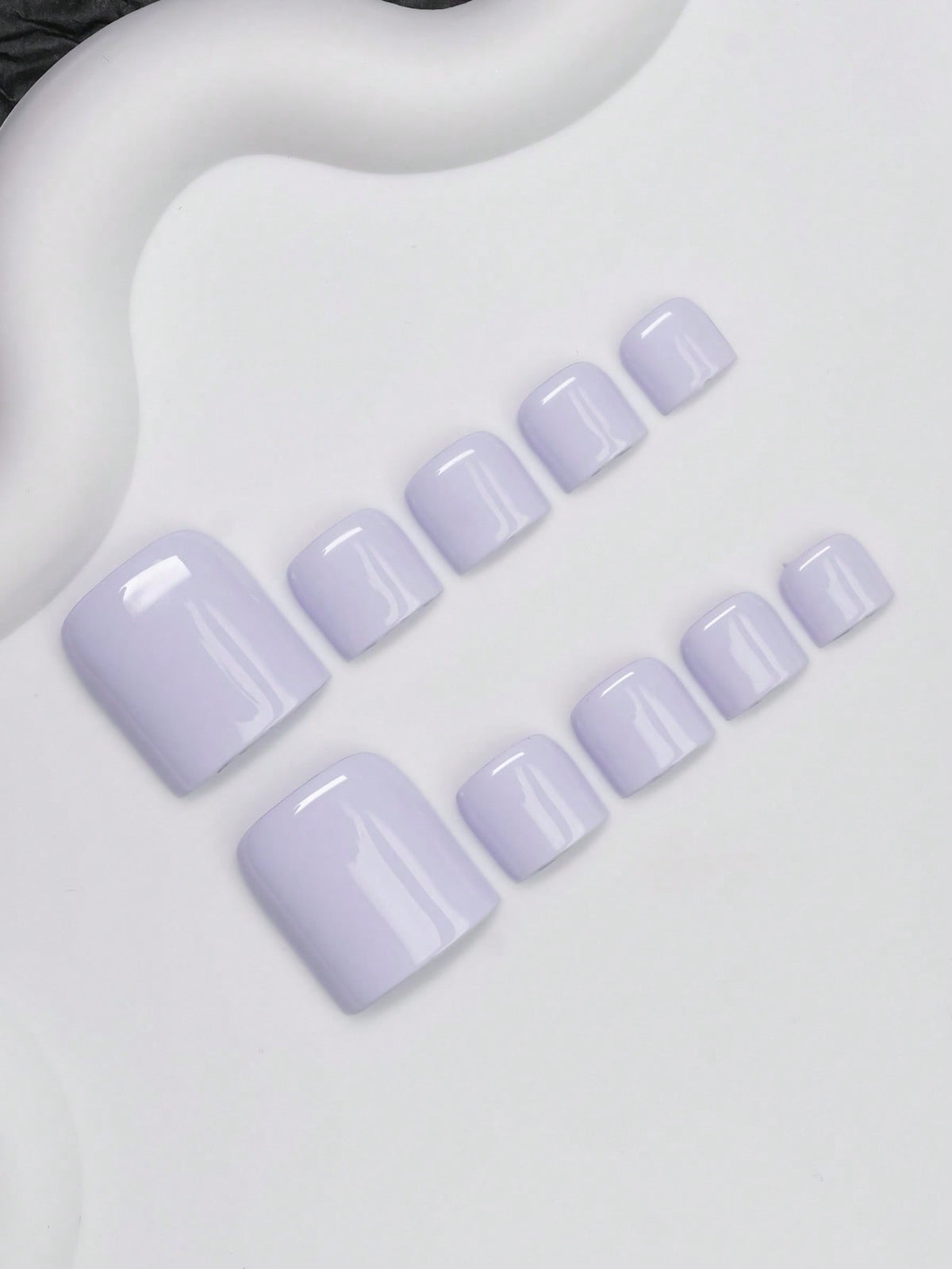 Lavender press-on toenails, angled view