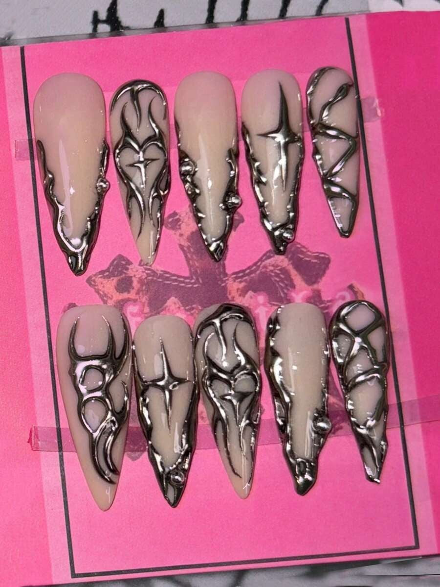 Chrome swirl stiletto press-on nails, detail view