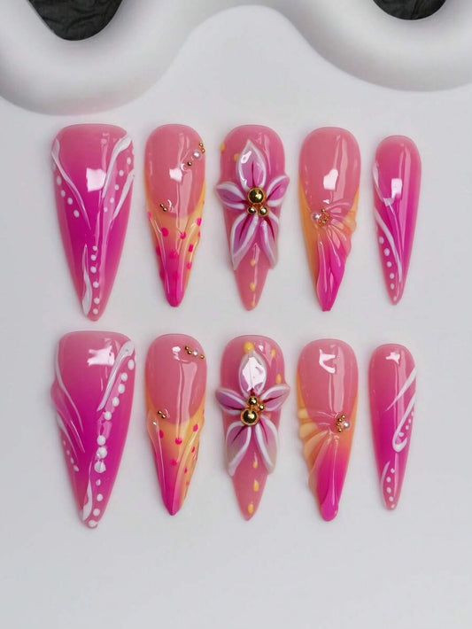 Hot pink and orange gradient long stiletto press-on nails with 3D lily and gold beads