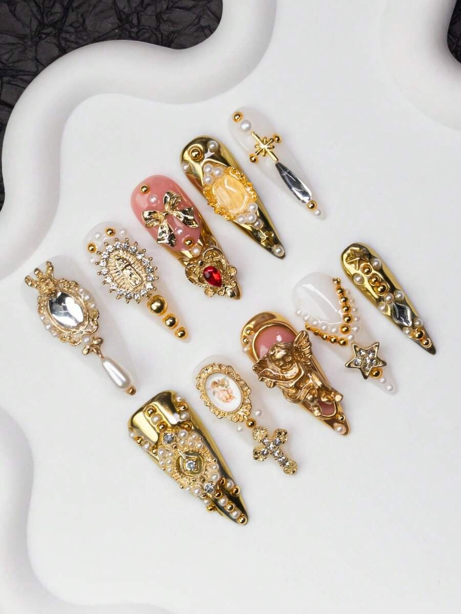 Baroque stiletto press-on nails with heart gem, detail view