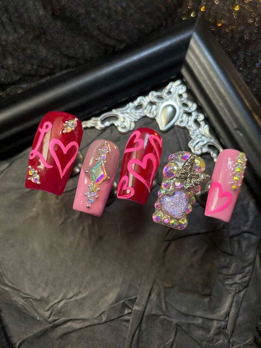 Love Letter press-on nails on hand