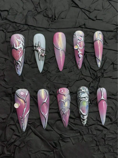 Pink, lilac and blue-grey cat-eye stiletto press-on nails with chrome silver lines
