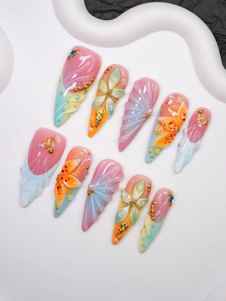Coral Cove press-on nails on hand