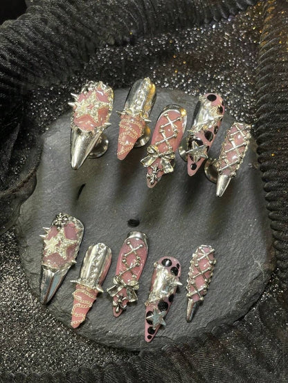Pink chrome-tip stiletto press-on nails, detail view