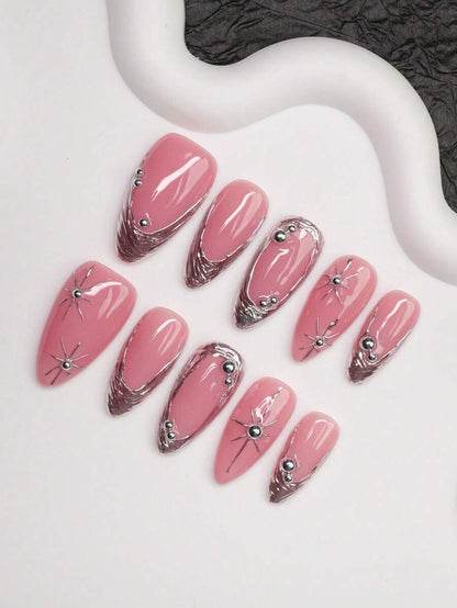 Pink chrome French almond press-on nails with silver stars