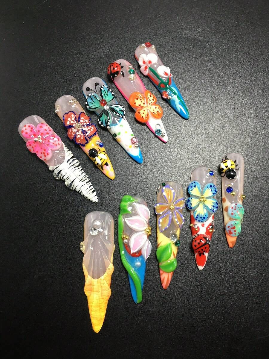 Garden Party press-on nails on hand