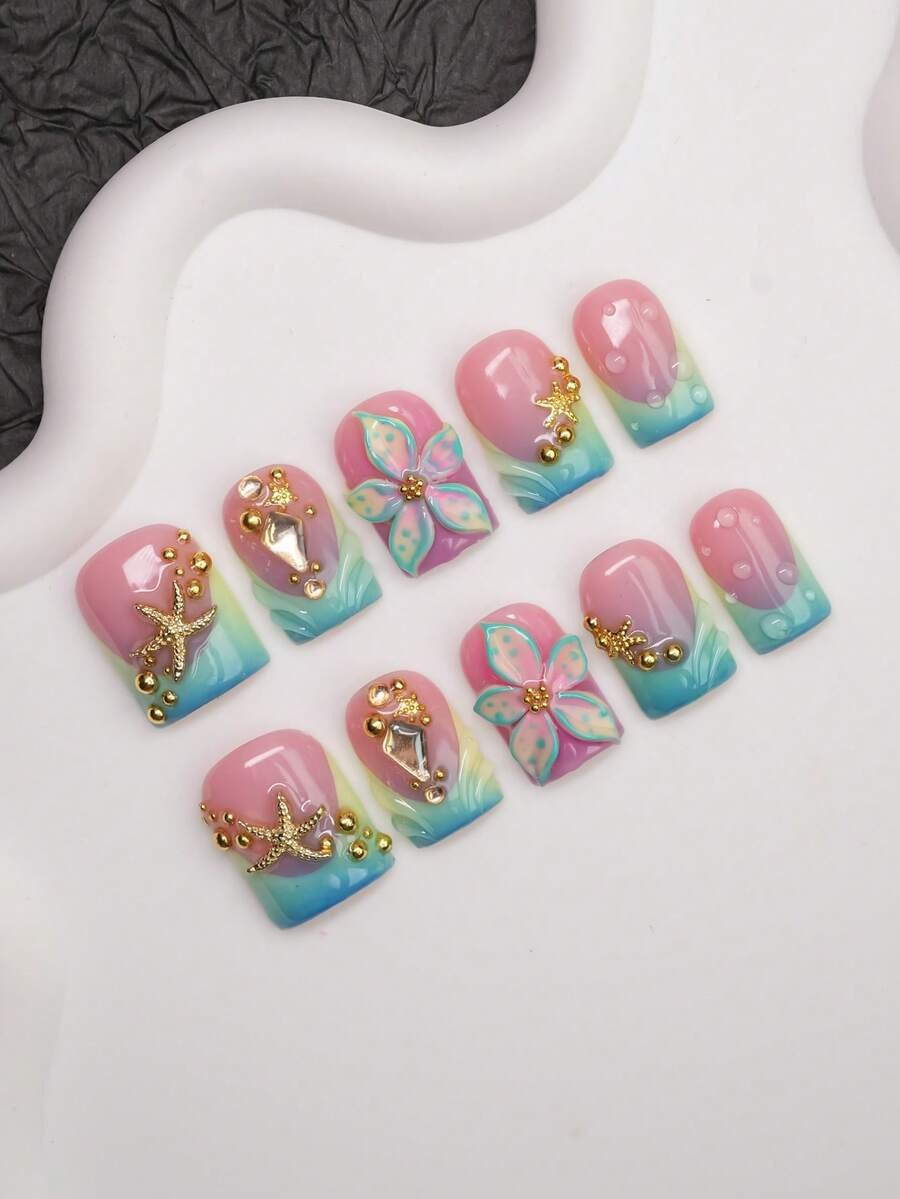 Pink-to-teal ombre short square press-on nails with gold starfish and 3D flower