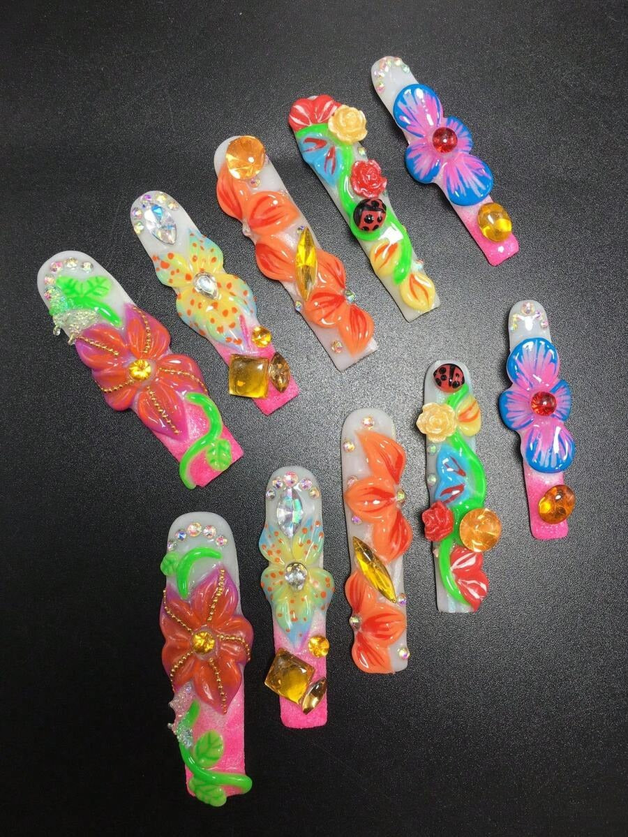 Orange, blue and purple 3D flower press-on nails with ladybugs
