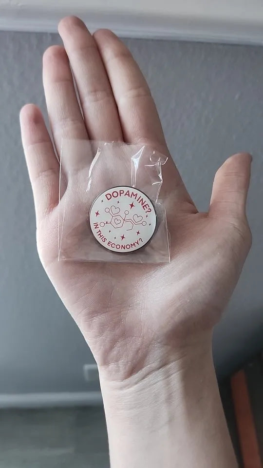 Customer photo - pin held in hand
