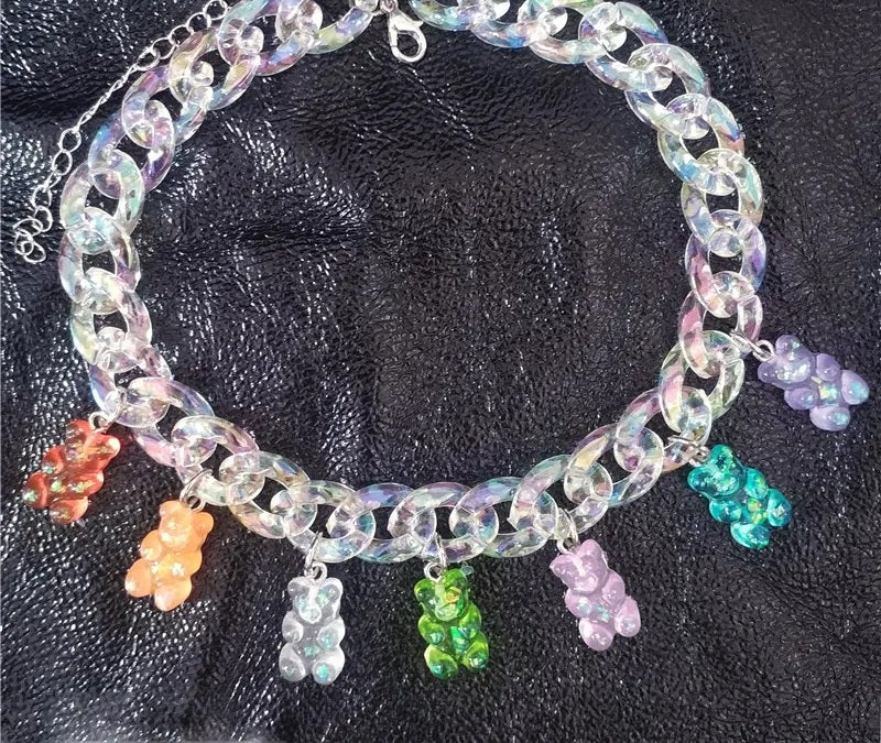Iridescent curb chain choker flat lay