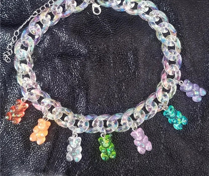 Iridescent curb chain choker flat lay